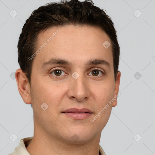 Joyful white young-adult male with short  brown hair and brown eyes