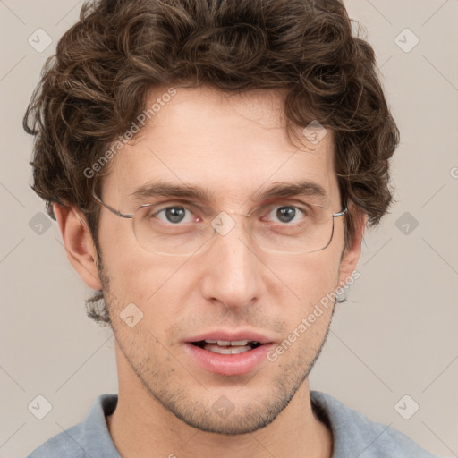 Joyful white adult male with short  brown hair and grey eyes