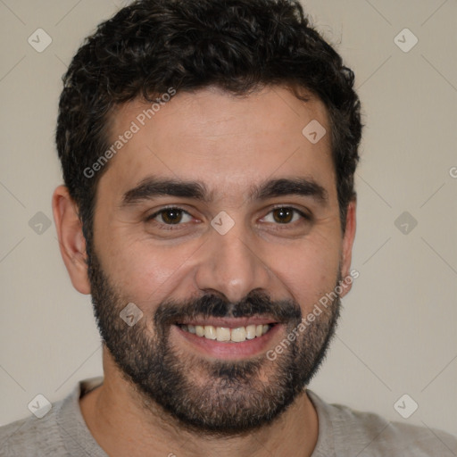 Joyful white young-adult male with short  black hair and brown eyes