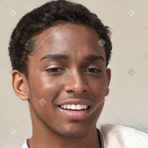 Joyful black young-adult male with short  brown hair and brown eyes