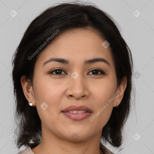 Joyful latino young-adult female with medium  brown hair and brown eyes