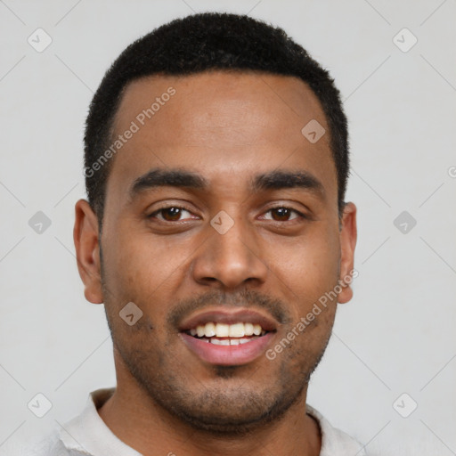 Joyful black young-adult male with short  black hair and brown eyes