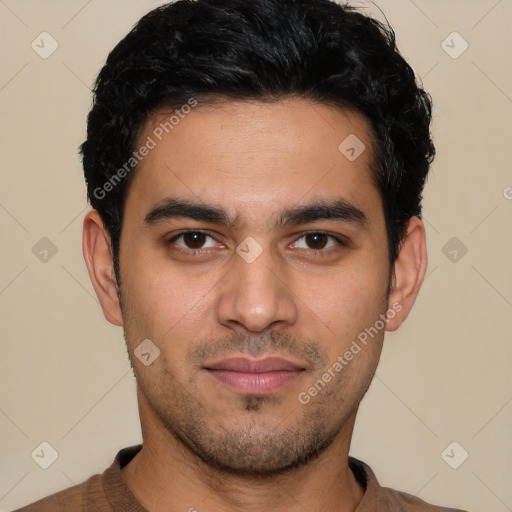 Joyful latino young-adult male with short  black hair and brown eyes