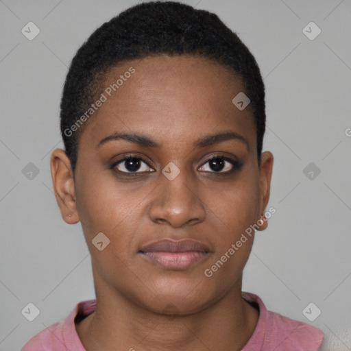 Joyful black young-adult female with short  brown hair and brown eyes