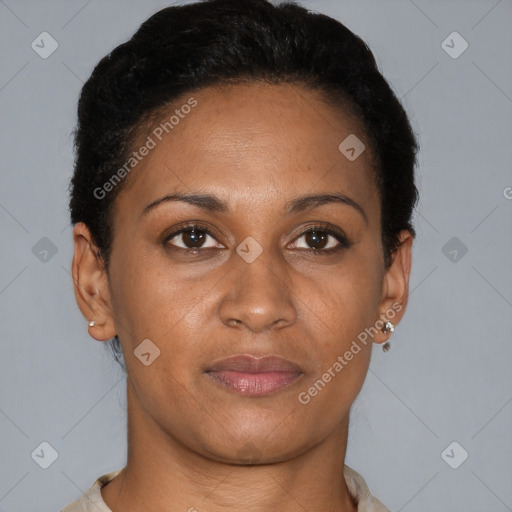 Joyful latino young-adult female with short  brown hair and brown eyes