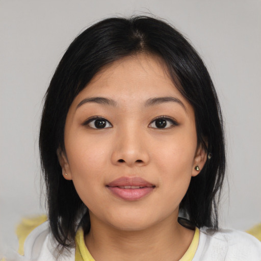 Neutral asian young-adult female with medium  black hair and brown eyes