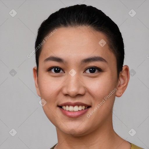 Joyful white young-adult female with short  black hair and brown eyes