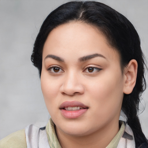 Joyful asian young-adult female with medium  black hair and brown eyes