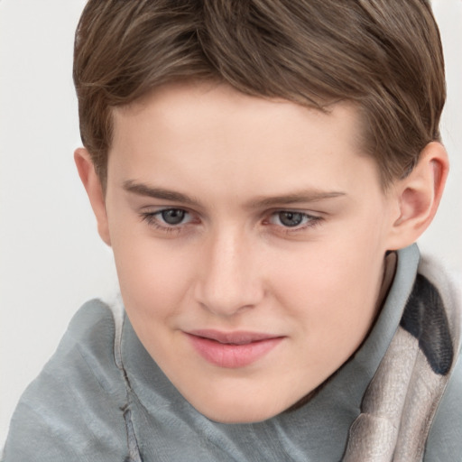 Joyful white child female with short  brown hair and grey eyes