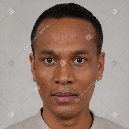 Neutral black adult male with short  black hair and brown eyes