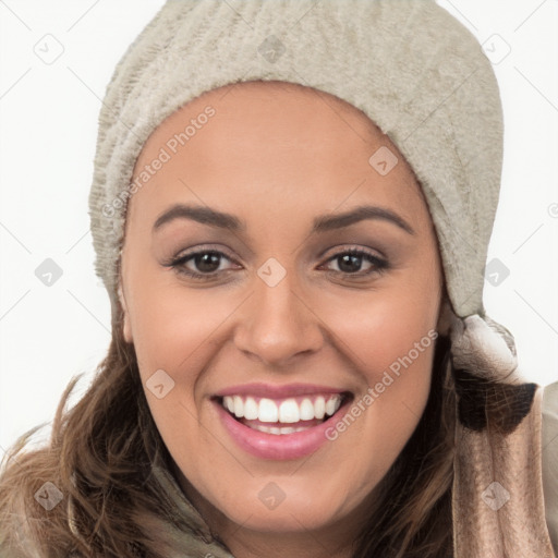 Joyful white young-adult female with long  brown hair and brown eyes