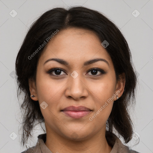 Joyful latino young-adult female with medium  brown hair and brown eyes