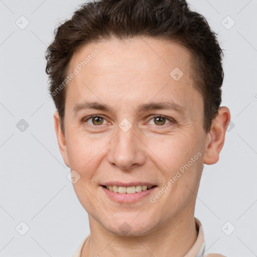 Joyful white adult female with short  brown hair and brown eyes