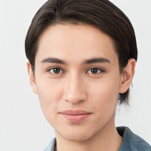 Joyful white young-adult male with medium  brown hair and brown eyes