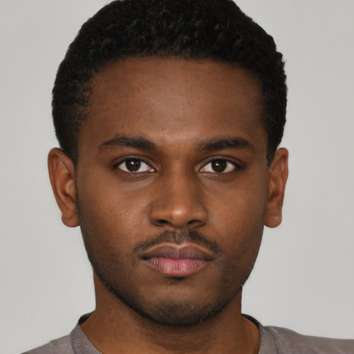 Neutral black young-adult male with short  brown hair and brown eyes