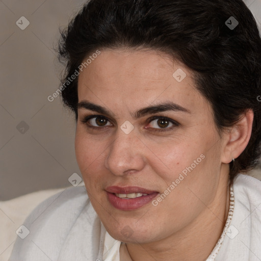 Joyful white adult female with short  brown hair and brown eyes