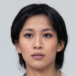 Neutral asian young-adult female with medium  black hair and brown eyes