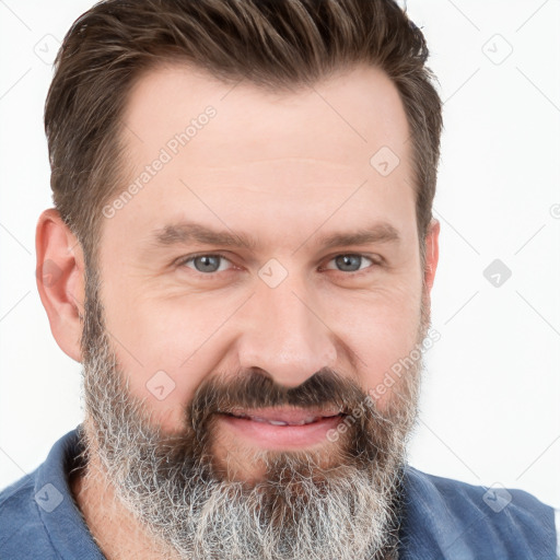 Joyful white adult male with short  brown hair and grey eyes