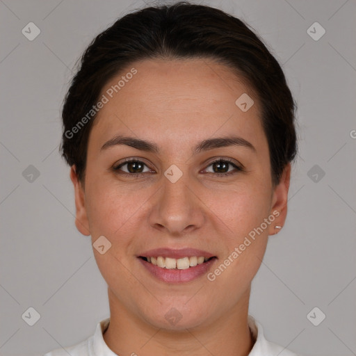 Joyful white young-adult female with short  brown hair and brown eyes