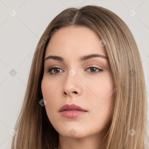 Neutral white young-adult female with long  brown hair and brown eyes