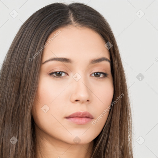 Neutral white young-adult female with long  brown hair and brown eyes