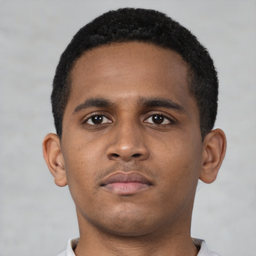 Neutral latino young-adult male with short  brown hair and brown eyes