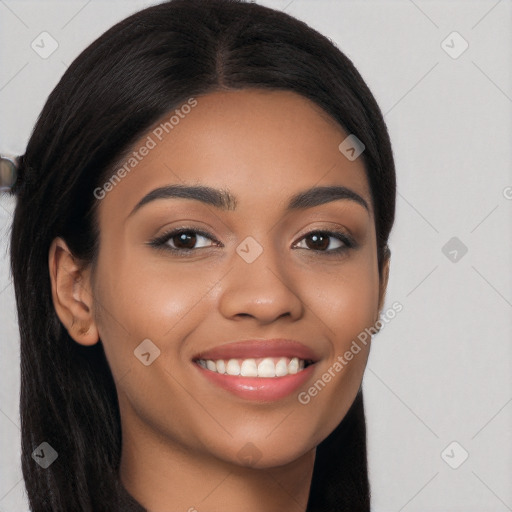 Joyful latino young-adult female with long  black hair and brown eyes