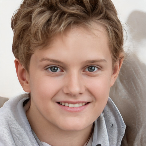 Joyful white child female with short  brown hair and blue eyes