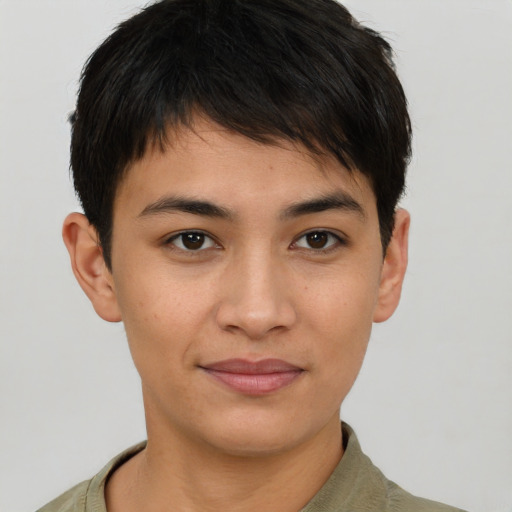 Joyful asian young-adult female with short  brown hair and brown eyes