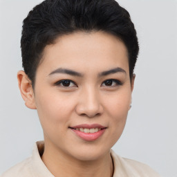 Joyful asian young-adult female with short  brown hair and brown eyes