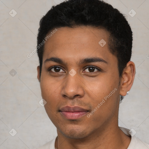 Joyful black young-adult male with short  black hair and brown eyes