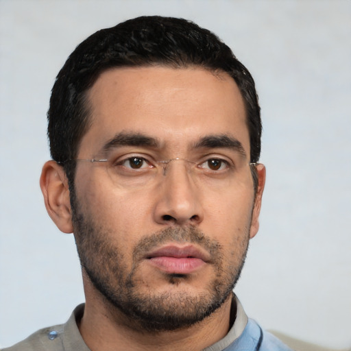 Neutral white young-adult male with short  black hair and brown eyes