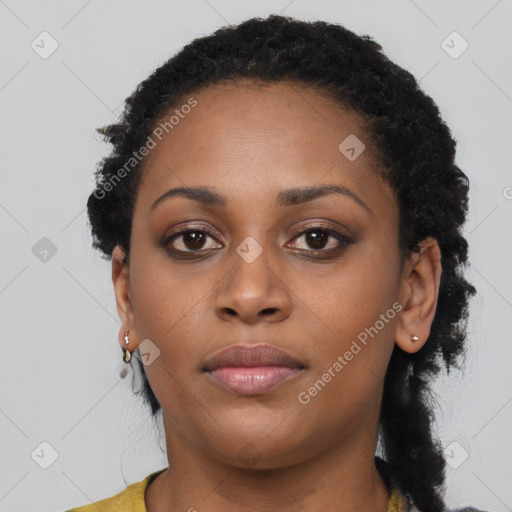 Neutral black young-adult female with long  brown hair and brown eyes