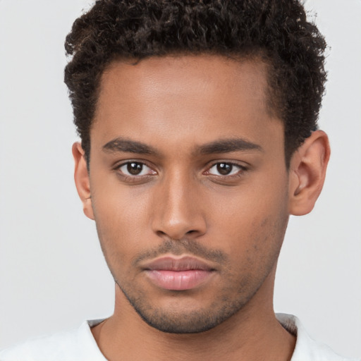 Neutral black young-adult male with short  brown hair and brown eyes