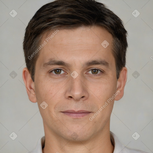 Joyful white young-adult male with short  brown hair and brown eyes