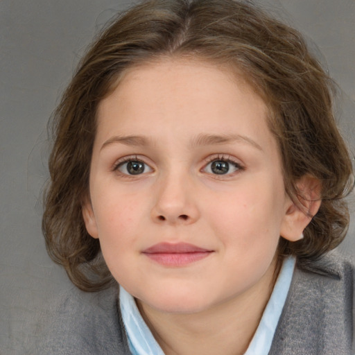 Joyful white child female with medium  brown hair and blue eyes