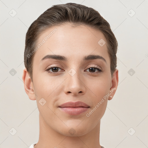 Joyful white young-adult female with short  brown hair and brown eyes