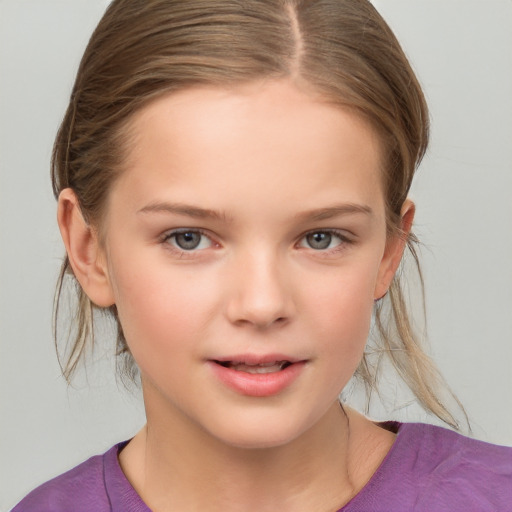 Joyful white child female with medium  brown hair and grey eyes