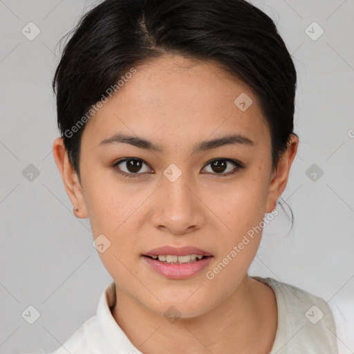 Joyful asian young-adult female with short  brown hair and brown eyes