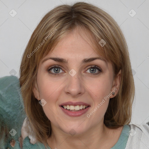 Joyful white young-adult female with medium  brown hair and blue eyes