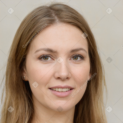 Joyful white young-adult female with long  brown hair and green eyes