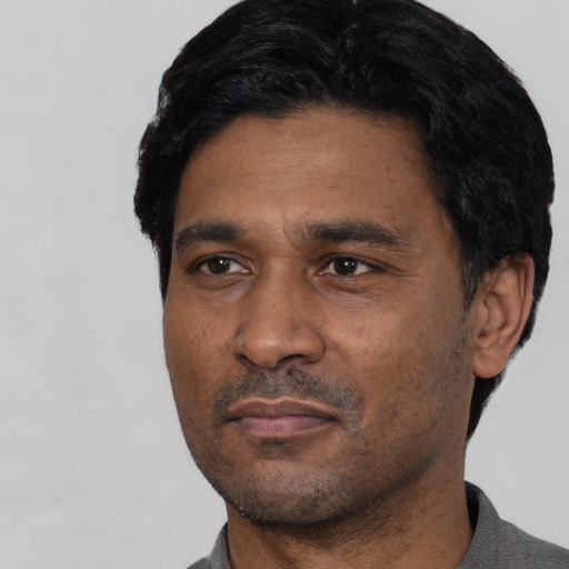 Neutral asian adult male with short  black hair and brown eyes