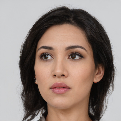 Neutral asian young-adult female with medium  black hair and brown eyes