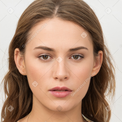 Neutral white young-adult female with long  brown hair and brown eyes