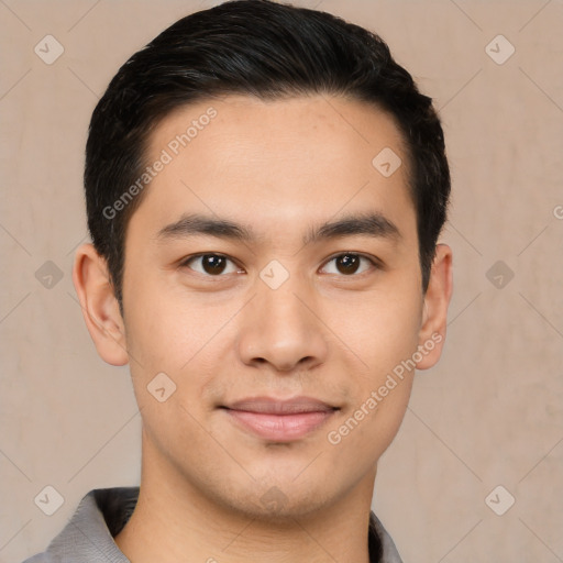 Joyful latino young-adult male with short  brown hair and brown eyes