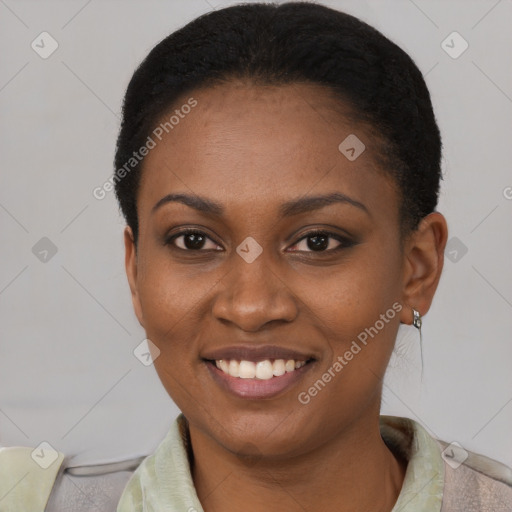 Joyful latino young-adult female with short  black hair and brown eyes
