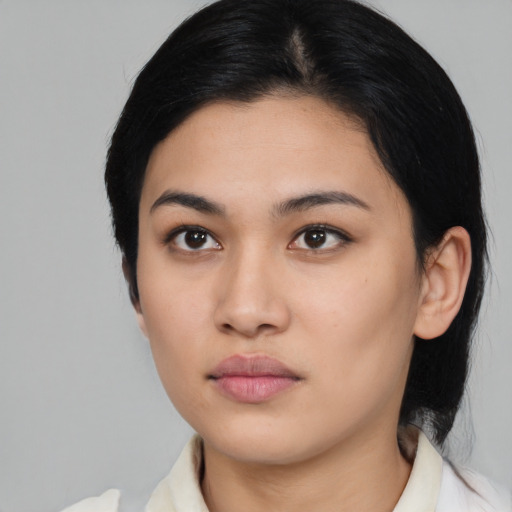 Neutral asian young-adult female with medium  black hair and brown eyes