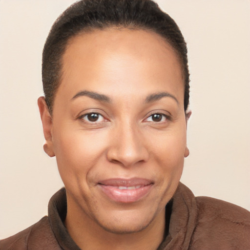 Joyful latino young-adult female with short  brown hair and brown eyes