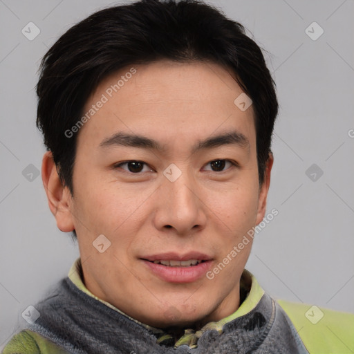 Joyful asian young-adult male with short  brown hair and brown eyes