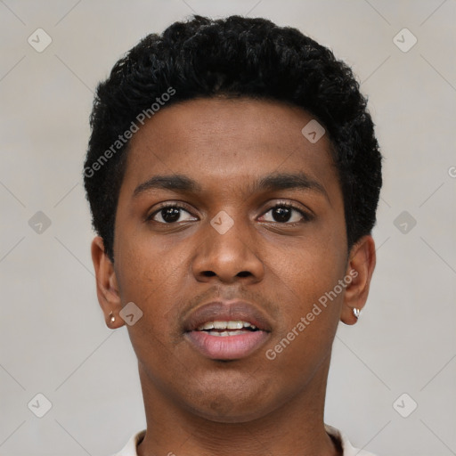 Neutral black young-adult male with short  black hair and brown eyes